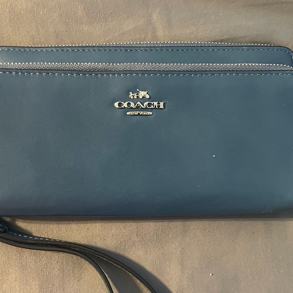 Coach Handbags - Blue Coach wristlet wallet. In new condition.
